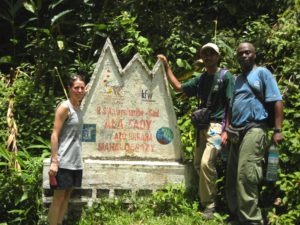 LCF staff standing at Anjanaharibe-Sud Special Reserve MNP sign in Madagascar